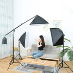 Kit d'éclairage studio comprenant une softbox 50x70cm, un trépied de 2m avec bras articulé et une barre de support.