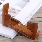 Étui demi-boîtier en cuir PU avec filetage 1/4 pouce pour appareils photo FUJIFILM X-T10 / X-T20 et FUJIFILM XT10.