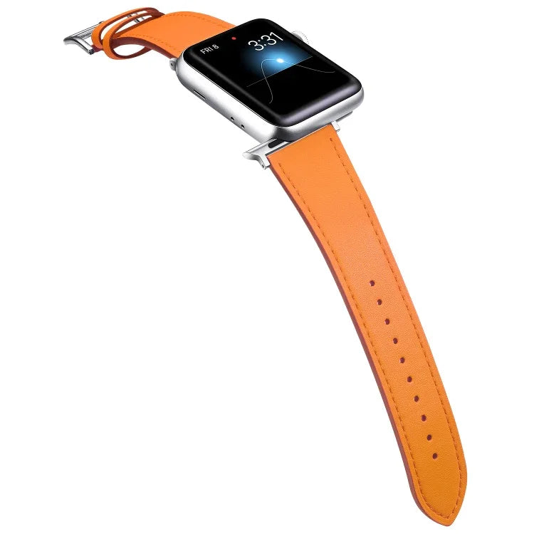 Small waist leather replacement strap for Apple Watch in vibrant orange color.