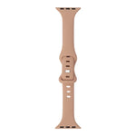 Slimming silicone replacement strap for Apple Watch in soft beige color, compatible with multiple Apple Watch models.