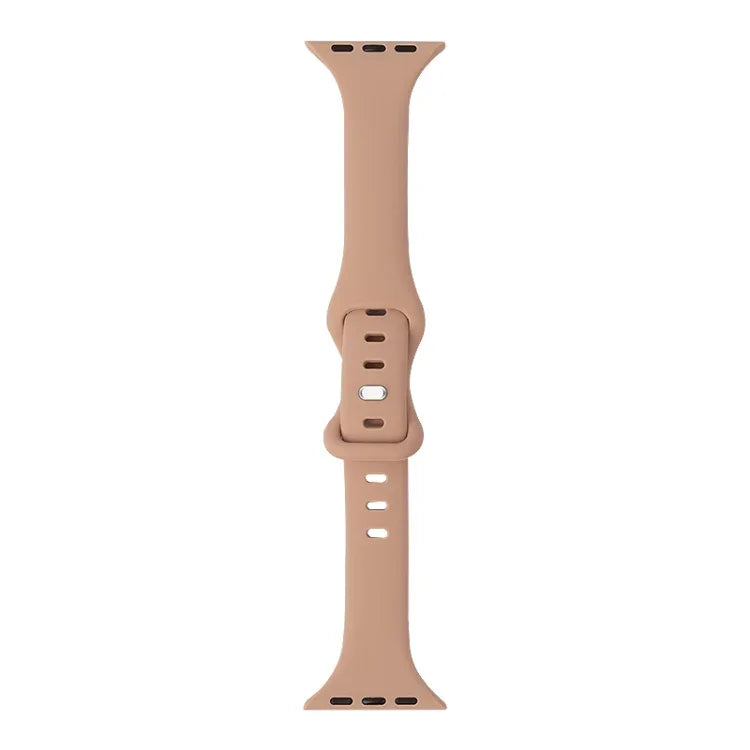 Slimming silicone replacement strap for Apple Watch in soft beige color, compatible with multiple Apple Watch models.