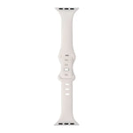 slimming silicone replacement strap for Apple Watch in soft white color, designed for comfort and easy adjustment.