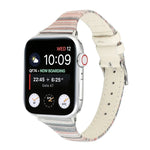 Genuine leather Apple Watch band on an Apple Watch displaying time and notifications.