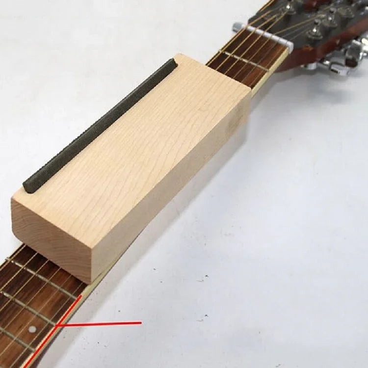 Outil de chanfreinage et de finition des frettes de guitare électro-acoustique