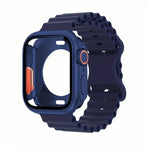 Bracelet de montre en silicone Ocean avec boucle papillon et boîtier en polycarbonate intégré, compatible avec Apple Watch Series 44 mm, 40 mm, 46 mm (Series 10/11) et 42 mm (Series 10/11).