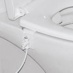 Dispositif sanitaire de chasse d'eau pour toilettes avec outil de siège à pulvérisation d'eau, outil de siège à pulvérisation d'eau