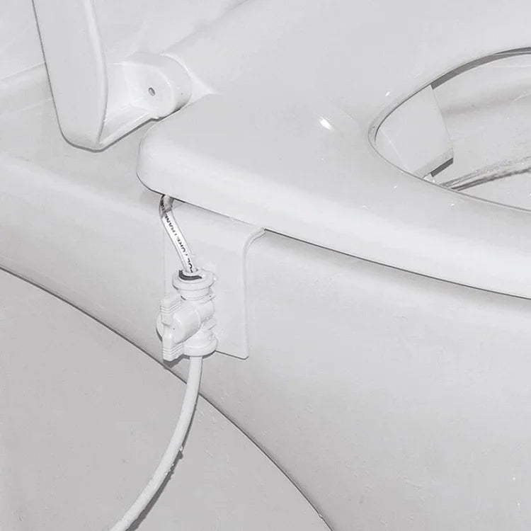 Dispositif sanitaire de chasse d'eau pour toilettes avec outil de siège à pulvérisation d'eau, outil de siège à pulvérisation d'eau