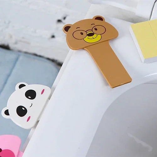10 PCS Dispositif de couvercle de toilette portable mignon en style dessin animé pratique, livraison style aléatoire, dispositif de couvercle de toilette mignon en dessin animé
