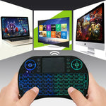 Clavier sans fil Mini i8 QWERTY 2,4 GHz avec rétroéclairage multicolore, pavé tactile et commandes multimédias pour PC, boîtier Android TV, Xbox, smartphones. Rétroéclairage multicolore personnalisable.
