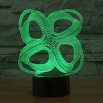 Lampe de bureau/veilleuse créative visuelle stéréo à 7 couleurs, style abstrait à quatre cercles