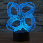 Lampe de bureau/veilleuse créative visuelle stéréo à 7 couleurs, style abstrait à quatre cercles