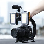 Kit de stabilisateur portable PULUZ en forme de U pour caméscopes, comprenant un support, un éclairage LED de studio, un microphone canon et une tête de trépied à griffe, compatible avec tous les appareils photo reflex et caméscopes domestiques.