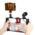 PULUZ Kit de montage vidéo 3 en 1 pour smartphones (iPhone, Galaxy, Huawei, Xiaomi, HTC, LG, Google et autres) avec éclairage LED pour selfies, microphone et trépied à griffe. Disponible en rouge et en version américaine.