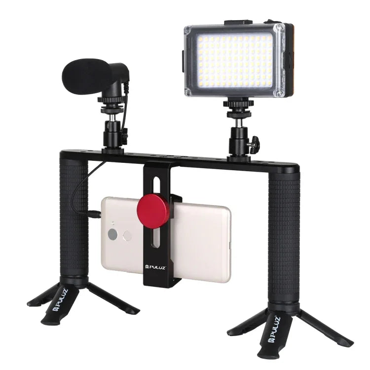 Kit de montage vidéo PULUZ 4 en 1 pour vlogging, diffusion en direct et selfies : lampe LED, poignée stabilisatrice, support en aluminium, microphone, fixation pour trépied et griffe porte-accessoires.