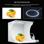 Kit de studio photo portable pliable avec panneau LED annulaire PULUZ de 23 cm, comprenant une tente et 6 fonds de couleur (noir, blanc, jaune, rouge, vert, bleu). Dimensions déplié : 24 cm x 23 cm x 23 cm. Panneau LED annulaire de 23 cm.