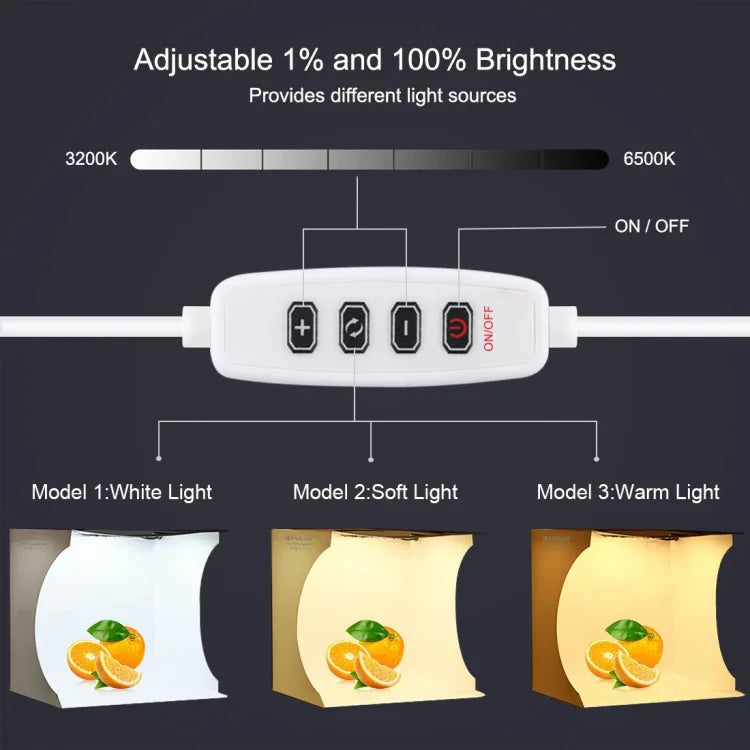 Kit de studio photo portable pliable avec panneau LED annulaire PULUZ de 23 cm, comprenant une tente et 6 fonds de couleur (noir, blanc, jaune, rouge, vert, bleu). Dimensions déplié : 24 cm x 23 cm x 23 cm. Panneau LED annulaire de 23 cm.