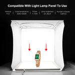 Kit de studio photo portable et pliable PULUZ avec anneau lumineux de 30 cm et 6 fonds de couleur (noir, blanc, jaune, rouge, vert, bleu). Dimensions déplié : 31 cm x 31 cm x 32 cm. Boîte de 30 cm.