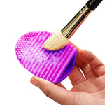 Outil de nettoyage en silicone pour pinceaux de maquillage et brosses de lavage.