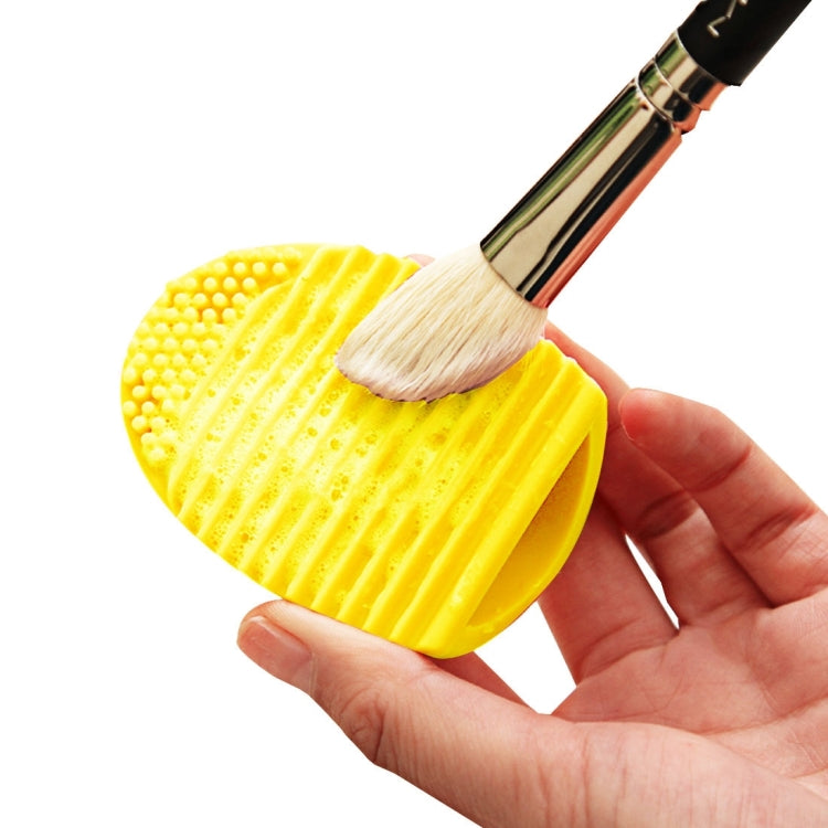 Outil de nettoyage en silicone pour pinceaux de maquillage et brosses de lavage.