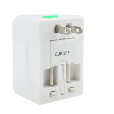 Adaptateur secteur de voyage universel (États-Unis/UE/Australie/Royaume-Uni) avec prise de charge USB et port USB.