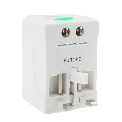 Adaptateur secteur de voyage universel (États-Unis/UE/Australie/Royaume-Uni) avec prise de charge USB et port USB.