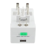 Adaptateur secteur de voyage universel (États-Unis/UE/Australie/Royaume-Uni) avec prise de charge USB et port USB.