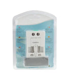 Adaptateur secteur de voyage universel (États-Unis/UE/Australie/Royaume-Uni) avec prise de charge USB et port USB.