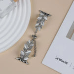 Bracelet de montre en alliage serti de diamants en forme de feuille, compatible avec Apple Watch 46 mm / 49 mm / 45 mm / 44 mm et Apple Watch 42 mm / 41 mm / 40 mm / 38 mm.