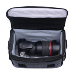 Sac bandoulière portable et étanche pour appareils photo reflex numériques, idéal pour les sports de plein air.