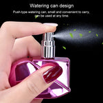 Vaporisateur de parfum en forme de cœur