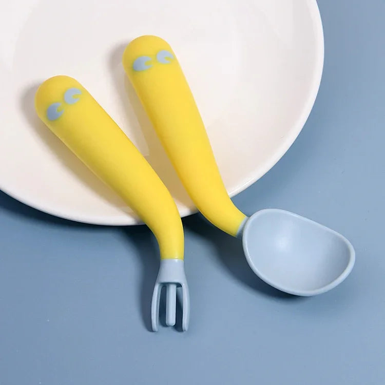 Bébé Apprend À Manger Coude D'entraînement Pliable Torsadant Cuillère Fourchette