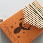 Kalimba portable à 17 tons, Acajou - Cerf classique, Bambou - Cerf classique, Acajou - Dieu soleil, Acajou - Étoile à six branches, Acajou - Bleu (Cerf classique), Épicéa - Cerf classique, Blanc - Cerf, Acacia - Cerf classique, Sapelli - Cerf classique...