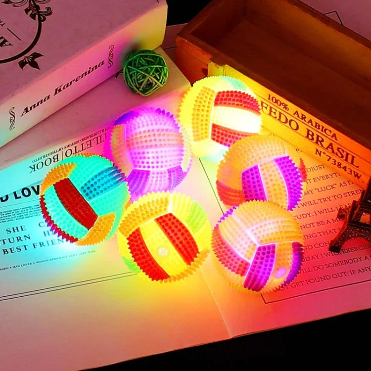Lot de 10 balles de volley-ball lumineuses rebondissantes avec sifflet et picots, couleur aléatoire, diamètre 6,5 cm ou 7,5 cm.