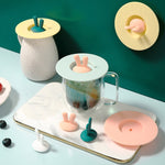 Couvercle de tasse en silicone en forme d'oreilles de lapin de qualité alimentaire, couvercle d'étanchéité de tasse de dessin animé anti-poussière et anti-fuite, jaune, vert, rose