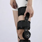 Genouillère de fixation réglable pour la protection des blessures au genou et des fractures (noir), taille unique
