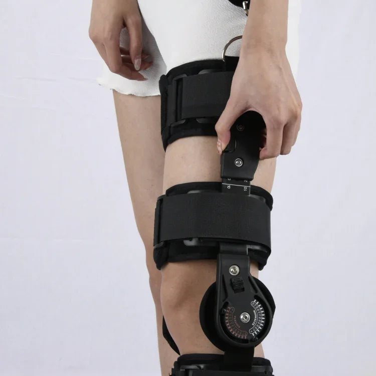 Genouillère de fixation réglable pour la protection des blessures au genou et des fractures (noir), taille unique
