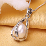 Pendentif Cage Femme Perle Naturelle