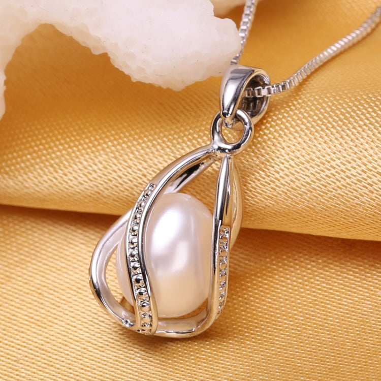 Pendentif Cage Femme Perle Naturelle