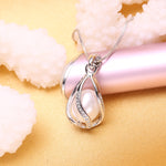 Pendentif Cage Femme Perle Naturelle