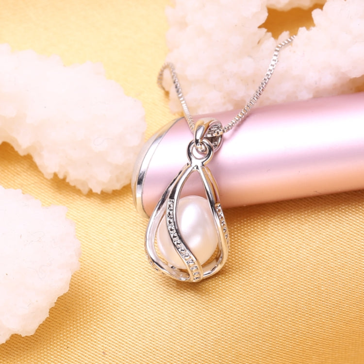 Pendentif Cage Femme Perle Naturelle