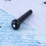 100 clous coniques en plastique pour cordes de guitare