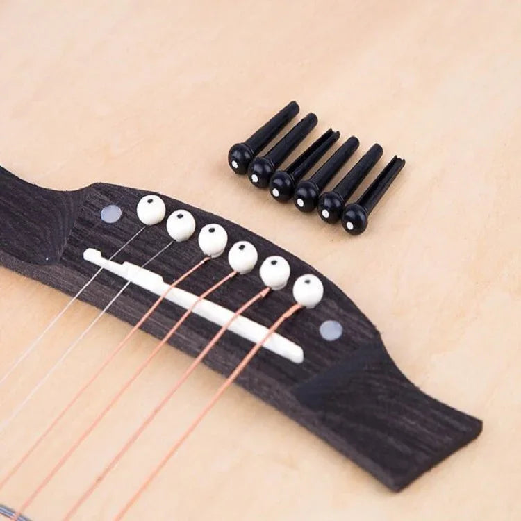 100 clous coniques en plastique pour cordes de guitare