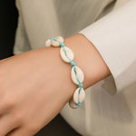 Bracelet coquillage réglable en corde tressée à la main