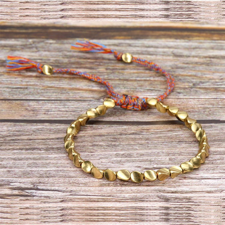 Bijou bracelet tissé main perles de cuivre irrégulières, mat, léger, corde rouge clair