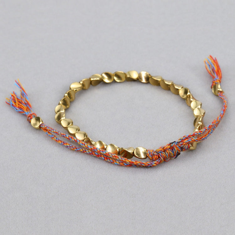 Bijou bracelet tissé main perles de cuivre irrégulières, mat, léger, corde rouge clair