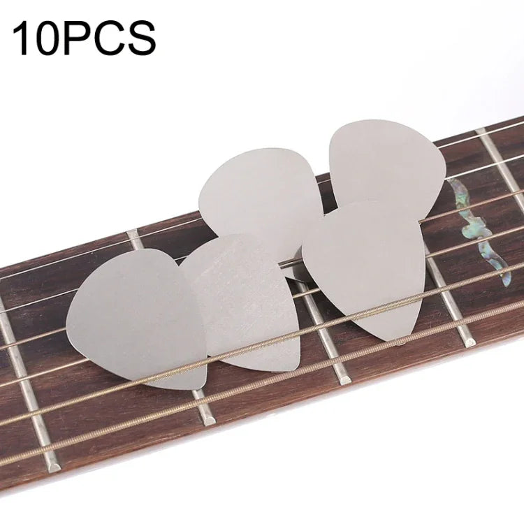 Lot de 10 pagaies de guitare Bayse en acier inoxydable pour pouces et doigts.