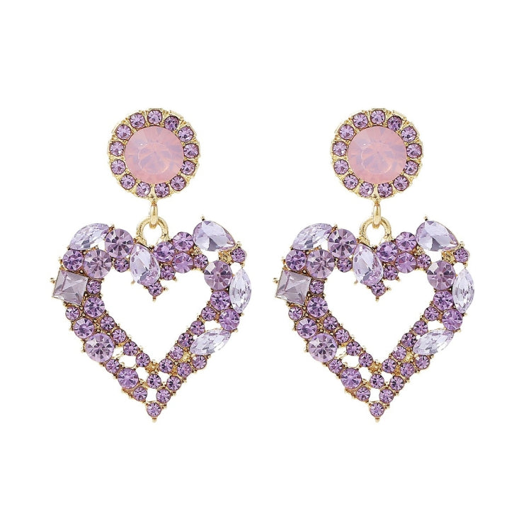 Boucles d'oreilles clou Amour Aiguille d'Argent, E2109-12 Diamant violet, E2109-13 Diamant blanc, E2112-9 Amour asymétrique or, E2112-10 Amour asymétrique K blanc