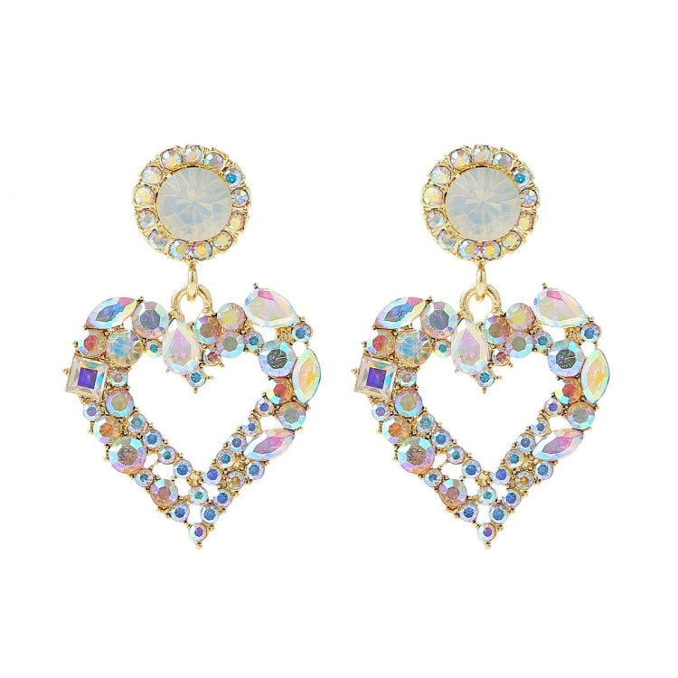 Boucles d'oreilles clou Amour Aiguille d'Argent, E2109-12 Diamant violet, E2109-13 Diamant blanc, E2112-9 Amour asymétrique or, E2112-10 Amour asymétrique K blanc