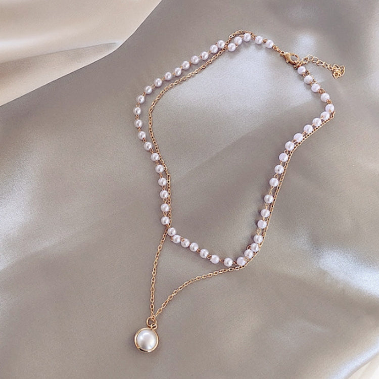 Collier à pendentif double rang de perles et perles simples