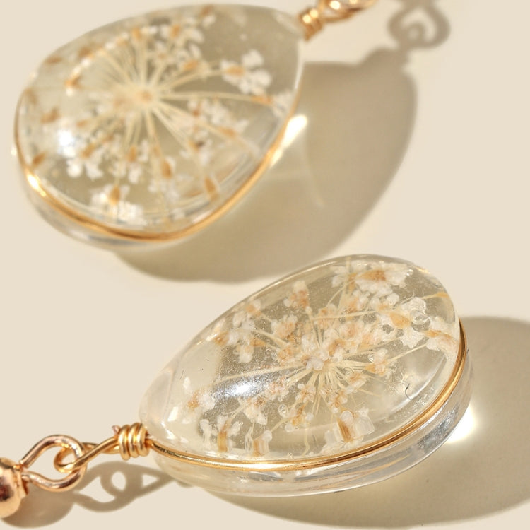 Boucles d'oreilles faites à la main en verre avec fleurs séchées et gypsophiles